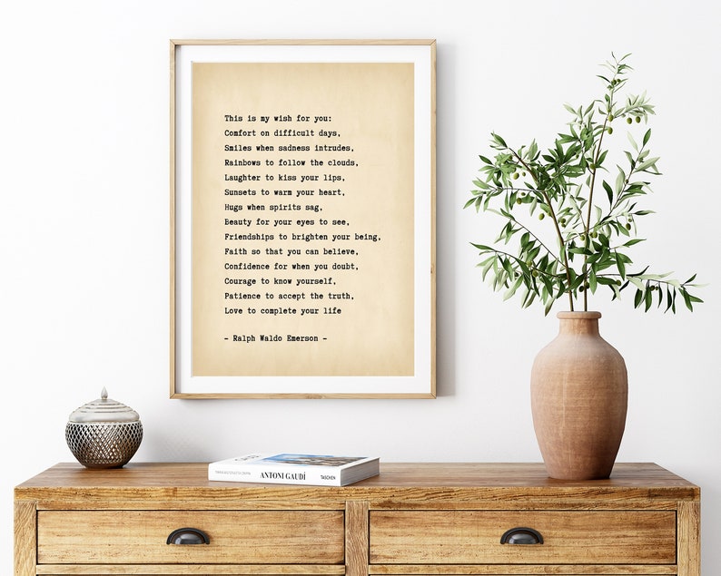 May include: A printable wall art print with a vintage aesthetic featuring a poem by Ralph Waldo Emerson. The poem is printed in black ink on a cream-colored background. The poem is titled "This is my wish for you." and includes lines such as "Comfort on difficult days." and "Love to complete your life."