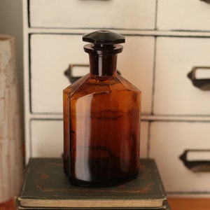 Vintage European amber real apothecary pharmacy glass jar with glass lid