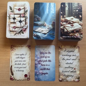 May include: A collection of oracle cards with a vintage aesthetic. The cards feature illustrations of envelopes, flowers, and feathers, with handwritten text. The deck is titled "Whispers Between The Pages Oracle".