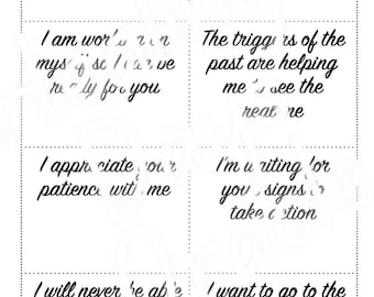 May include: A white card with black cursive text. The card is divided into sections, each containing a different romantic phrase. Phrases include "I want all of you" and "With you by my side."