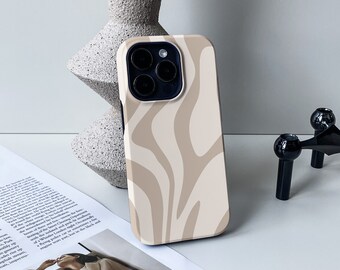 Può includere: Una custodia per telefono beige e bianca con un motivo astratto ondulato. La custodia è progettata per uno smartphone con un rigonfiamento della fotocamera sul retro.