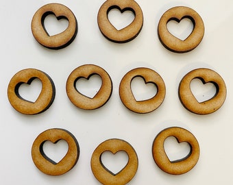 Small circles with heart cutout for scrapbooking or decoration