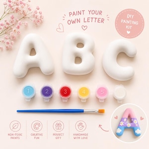 May include: A DIY painting kit featuring white ceramic letters A, B, and C, with numbered paint pots and a paintbrush. The kit includes the text "PAINT YOUR OWN LETTER" and "DIY PAINTING KIT". The painted letter A is shown as an example.