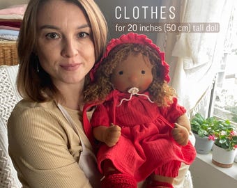 May include: A doll wearing a red dress, bonnet, and shoes. The doll is approximately 20 inches tall. The text on the image reads "CUSTOM MADE CLOTHES for 20 inches tall doll."
