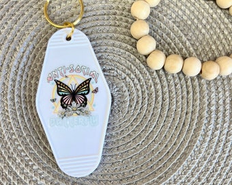 Antisozialer Schmetterling Retro-Motel-Hotel-Schlüsselanhänger