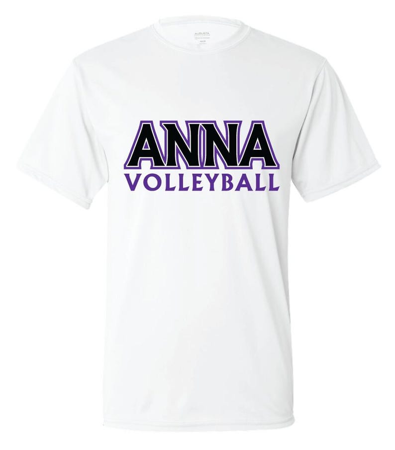 K&ouml;nnte beinhalten: Wei&szlig;es T-Shirt mit einer schwarzen und lila Grafik, auf der "ANNA VOLLEYBALL" steht.