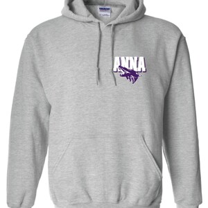 May include: A grey hooded sweatshirt with a white pocket on the front. The pocket has a purple wolf logo and the word "ANNA" in white letters.