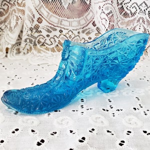 Vintage Collectible Glass. Slipper with Bow Animals & Figurines by DEGENHART GLASS CO.  Blue Glass Shoe with "Daisy and Button" pattern.