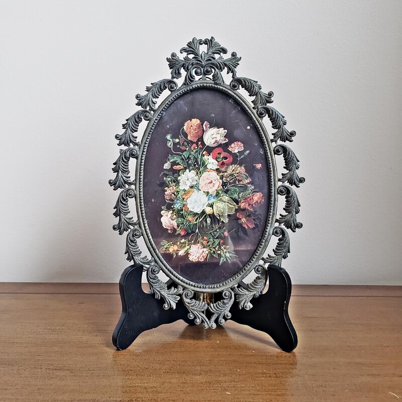 Ornate Victorian Wall Mirror with a Gilded Frame Displayed Prominently