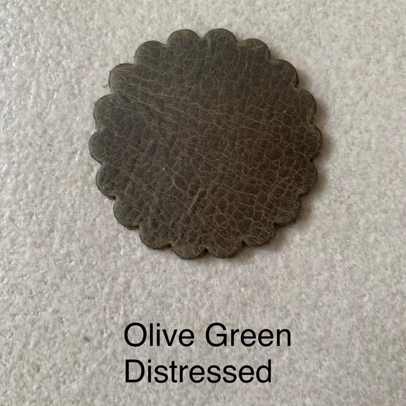 Olive green leather rosette.
