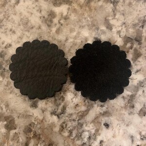 Black leather rosette