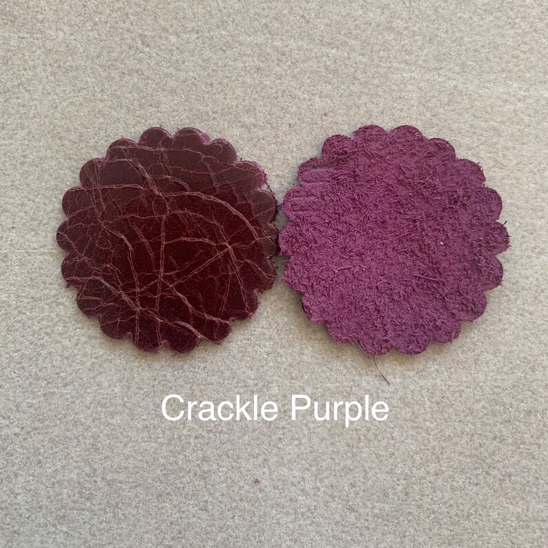 Distressed purple leather rosette.