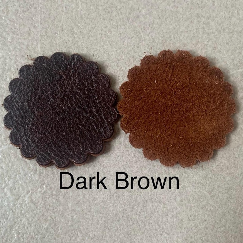 Top and bottom of dark brown leather rosette.