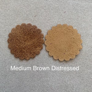Medium brown distressed leather rosette.