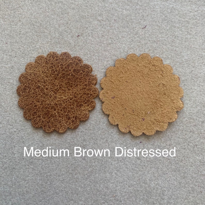 Medium brown distressed leather rosette.