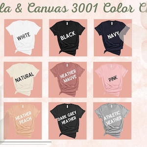 May include: A color chart displaying nine Bella & Canvas 3001 t-shirts in various colors. The colors include white, black, navy, natural, heather mauve, pink, heather peach, dark grey heather, and athletic heather. Each shirt is folded and labeled with its color name.