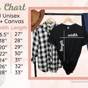 May include: A size chart for Bella + Canvas 3001 Unisex t-shirts, with measurements in inches. Sizes range from XS (16.5" width, 27" length) to 3XL (28" width, 33" length). A black t-shirt hangs on a rack.