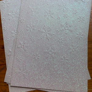 Snowflake embossed card mat