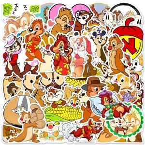 May include: A sheet of colorful cartoon character stickers featuring Chip and Dale. The stickers are in various poses and expressions, including sleeping, smiling, and holding objects like a corn cob and a sunflower.