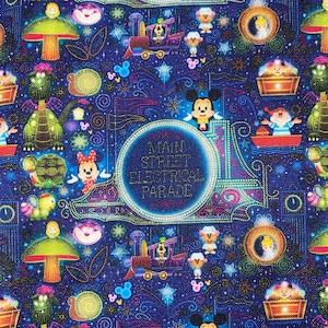 May include: A blue fabric with a repeating pattern of Disney characters and the words "Main Street Electrical Parade". The characters include Mickey Mouse, Donald Duck, Goofy, and others. The fabric is decorated with stars, swirls, and other festive details.