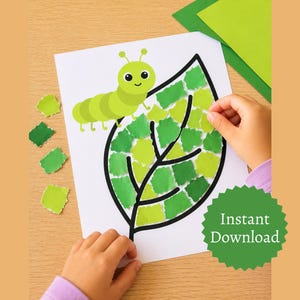 May include: A craft project featuring a large leaf outline filled with torn green paper pieces. A cartoon caterpillar sits above the leaf. The words "Instant Download" are on a green starburst. The project is on a white paper, with green paper scraps nearby.