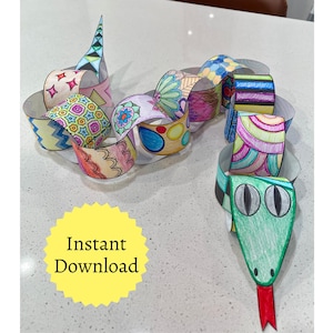May include: A colorful paper chain snake craft with a green head, red tongue, and patterned body segments. The paper links are decorated with various designs and colors. The image includes the text "Instant Download" on a yellow burst.