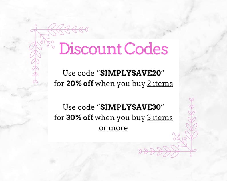 May include: A white rectangular sign with pink floral corner accents and black text that reads: Discount Codes. Use code SIMPLYSAVE20 for 20% off when you buy 2 items. Use code SIMPLYSAVE30 for 30% off when you buy 3 items or more.