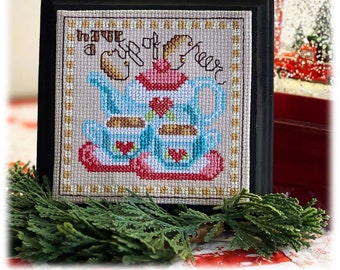 Puede incluir: Un diseño de punto de cruz enmarcado que presenta una tetera y tazas de té con el texto "Have a Cup of Cheer".