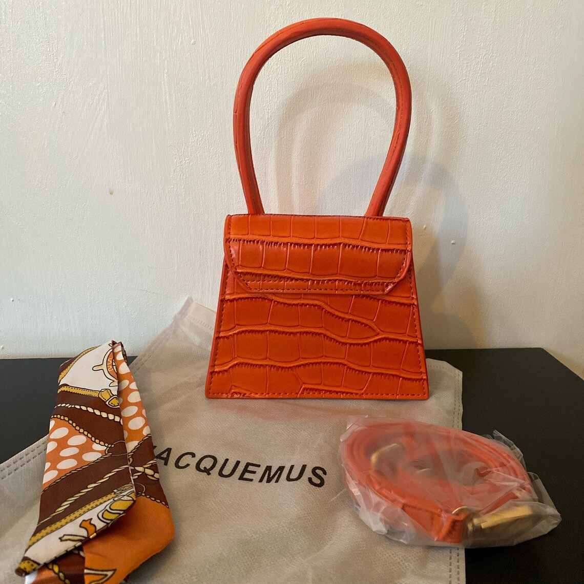 jacquemus orange mini bag