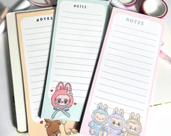 Blocs de notas largos de pequeños monstruos