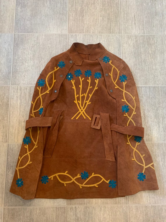 Soft leather suede. Pocahontas style cape. Not too
