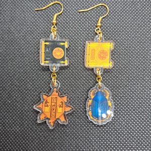 Mismatched Earrings - Book of the Dead - Book of the Living - Scarab - Key of Hamunaptra - The Mummy - 1999