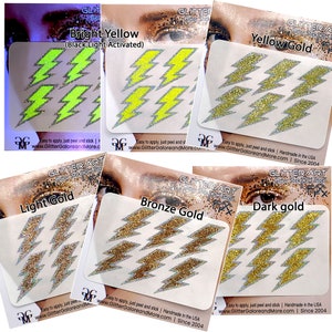 May include: Six sheets of glitter sticker tattoos featuring lightning bolt designs in various colors, including bright yellow, yellow gold, light gold, bronze gold, and dark gold. The stickers are labeled with the color and "Glitter Stick On Tattoo" and include instructions for application.