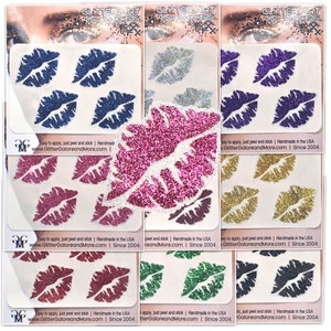 May include: Assortment of glitter lip stick-on tattoos in various colors, including blue, silver, pink, purple, gold, red, green, and black. Easy to apply, just peel and stick. Handmade in the USA. www.GlitterGaloreandMore.com | Since 2004