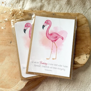 Sei wie ein Flamingo in einer Welt voller Tauben - Postkarte inkl. Umschlag (A6)
