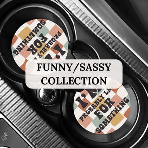 May include: Two car coasters with a retro checkered pattern in orange, cream, and teal. The coasters have the text "I'm probably late for something" in a playful font. The image also includes the text "Funny/Sassy Collection".