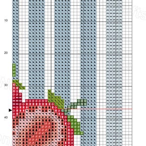 May include: Cross-stitch pattern chart featuring a large strawberry design. The pattern uses a grid with red, green, and blue thread colors. The text "Strawberries large" is at the top. The Etsy shop name is at the bottom.