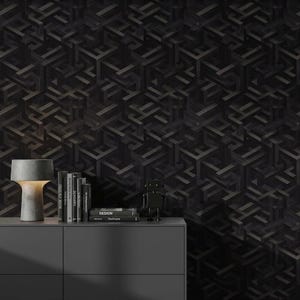 May include: A dark gray dresser with a geometric pattern wallpaper background. A gray lamp, books, and a small robot figurine are on top of the dresser. The books have titles and the word "Design" is visible on one book.