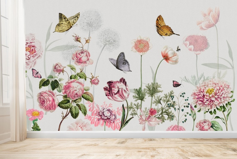 May include: A floral wallpaper design featuring pink roses, tulips, and other flowers with butterflies in shades of yellow, brown, and gray against a white background.