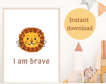 May include: A printable art print featuring a cartoon lion with the text "I am brave" in brown lettering on a white background.