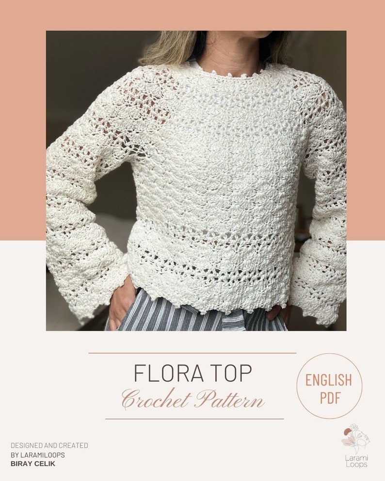 Puede incluir: Un top blanco de crochet con un patr&oacute;n de encaje. El top tiene mangas largas y un escote redondo. El patr&oacute;n se llama "Flora Top Crochet Pattern" y est&aacute; disponible en ingl&eacute;s.