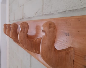 Tabla de ganchos de bata