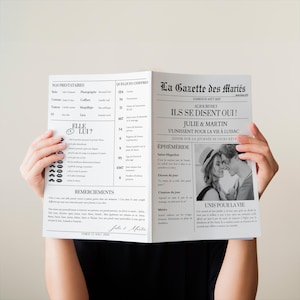 May include: A black and white newspaper-style wedding announcement with the headline "Ils se disent oui!"  Julie & Martin. The announcement includes a photo of the couple and details about their wedding day. The text also includes the date "Samedi 13 Aout 2022".