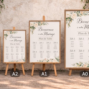Peut inclure: Quatre panneaux de mariage encadrés en bois avec des accents floraux et le texte "Bienvenue à notre Mariage" et "Plan de Table". Les panneaux sont sur des chevalets en bois. Les tailles sont A3, A2, A1 et A0.