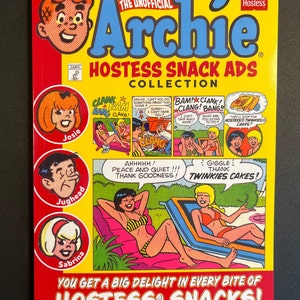 May include: A yellow and red comic book cover featuring the Archie characters. The cover features the text "The Unofficial Archie Hostess Snack Ads Collection". The characters are depicted in various scenes with Hostess snack products. The text "You get a big delight in every bite of Hostess Snacks!" is at the bottom of the cover.