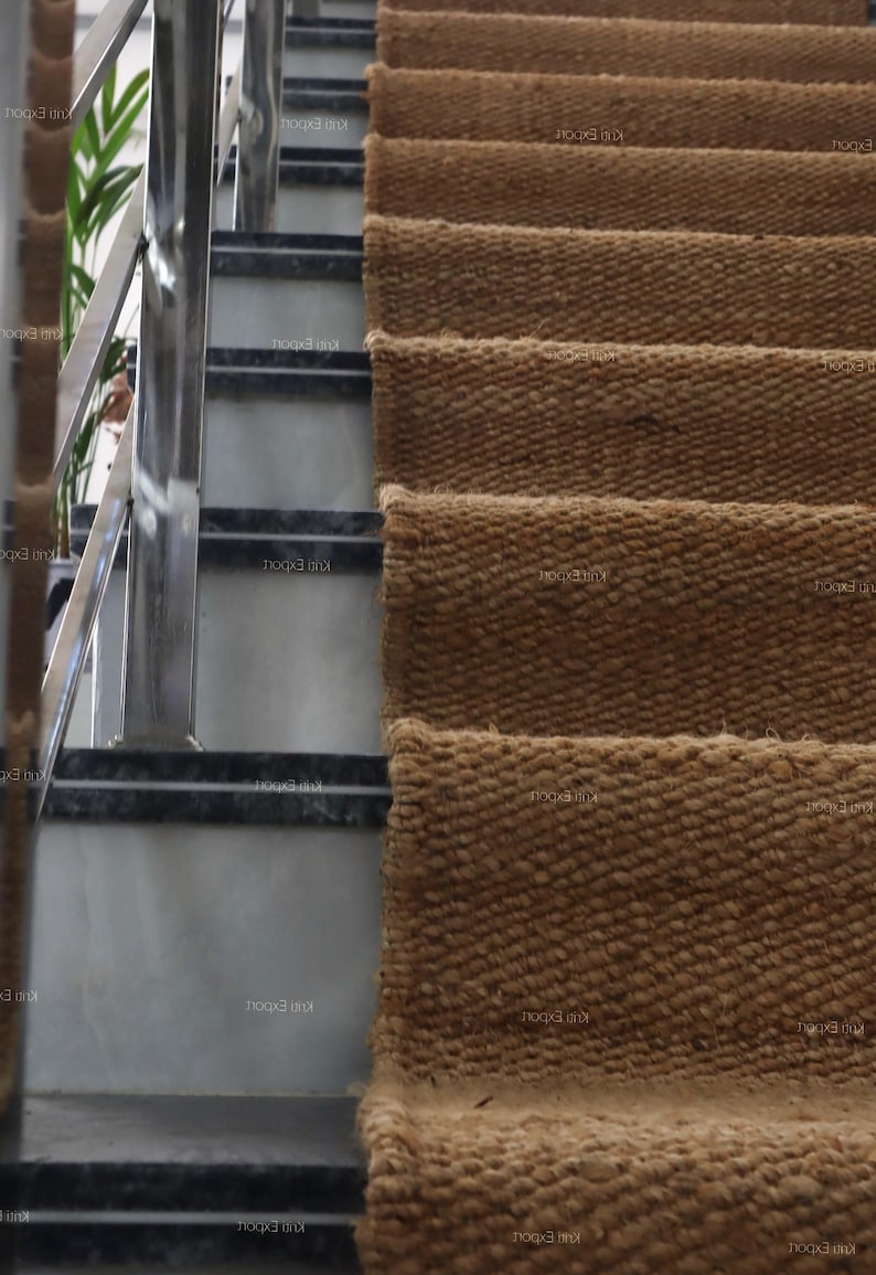 Handmade natural jute stair runner rug made from durable hemp and jute fibers, perfect for custom stairways and hallways. This eco-friendly, rustic runner features a minimalist woven texture ideal for farmhouse, boho, or modern decor. Perfect as a custom-size rug or stair carpet, it brings warmth, sustainability, and a natural touch to any interior space. Designed for high-traffic areas and handcrafted with care.