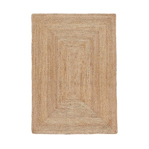 May include: A natural fiber rug with a woven design. The rug has a rectangular shape and a light brown color.