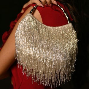 Cartera de mano de plumas hecha a mano de diseñador