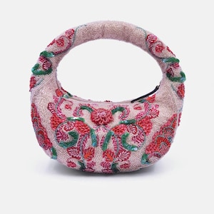 Bolso baguette de lujo adornado con lentejuelas