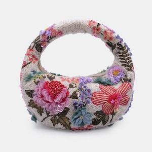Bolso baguette de lujo adornado con lentejuelas